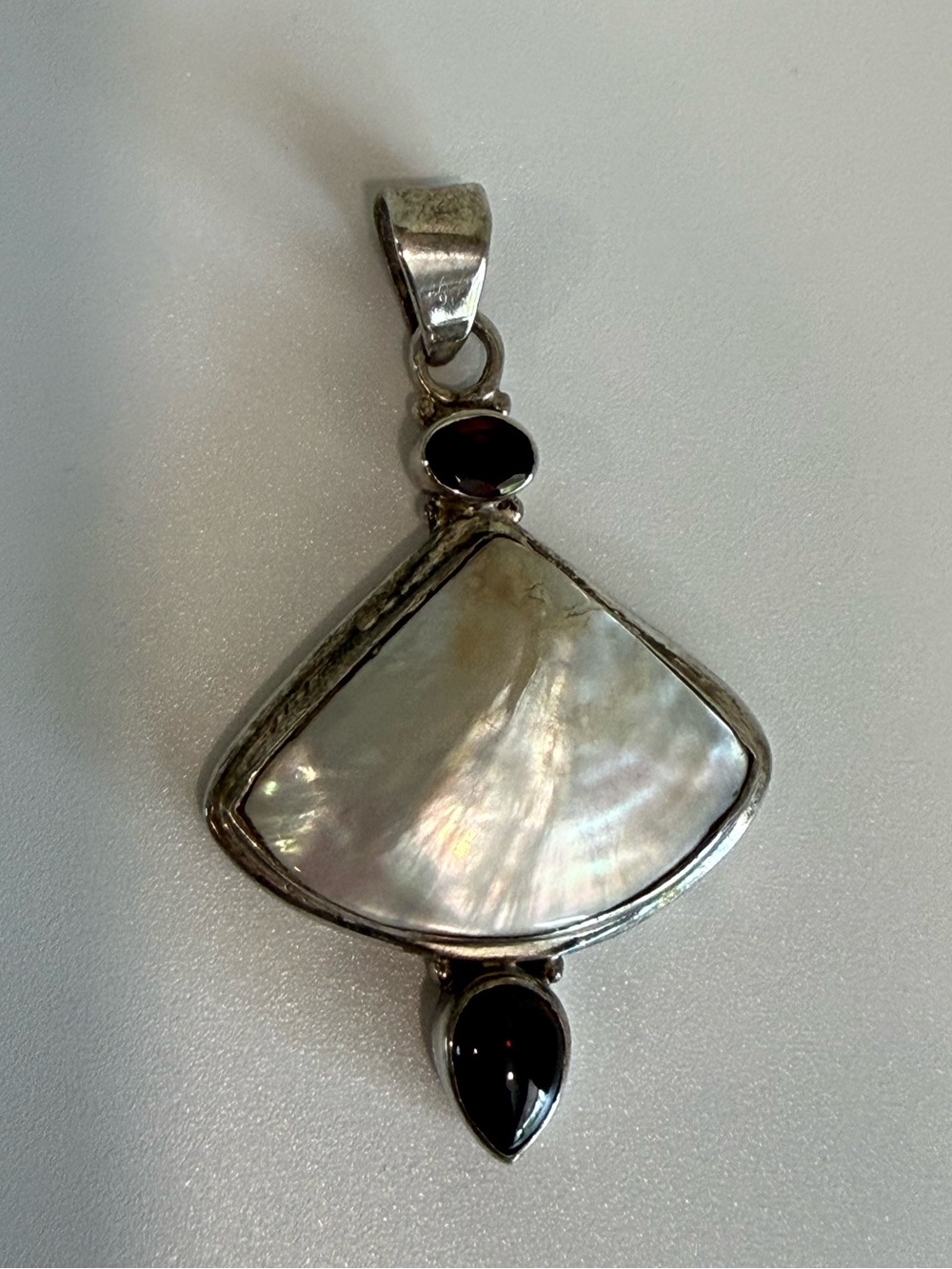 Sterling Silver Mother of Pearl Pendant with Garnet Accents